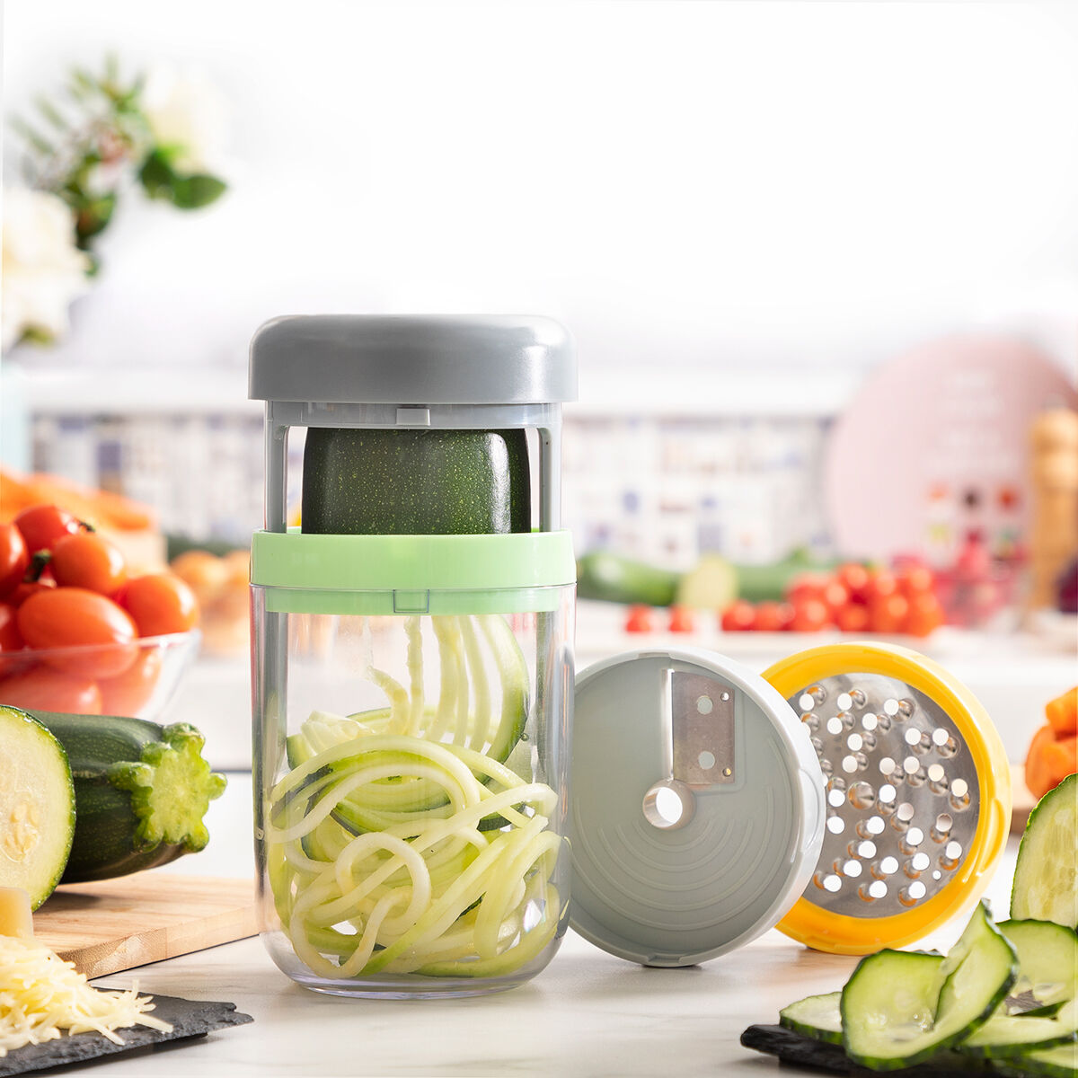 Spiraalvormige groentesnijder en -rasp met recepten Vigizer InnovaGoods